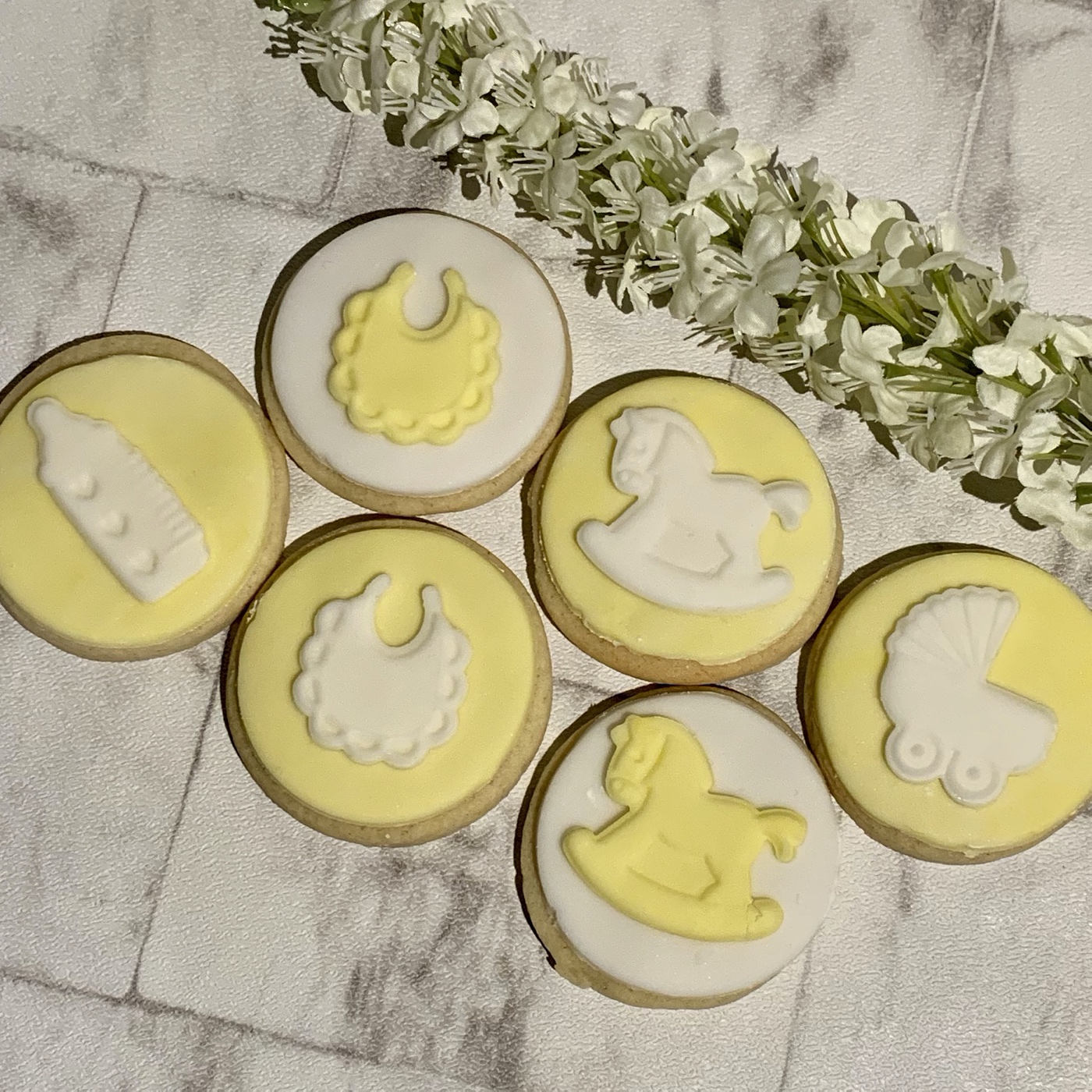 Baby Shower Biscuits Created for you by Enchanting Bakes