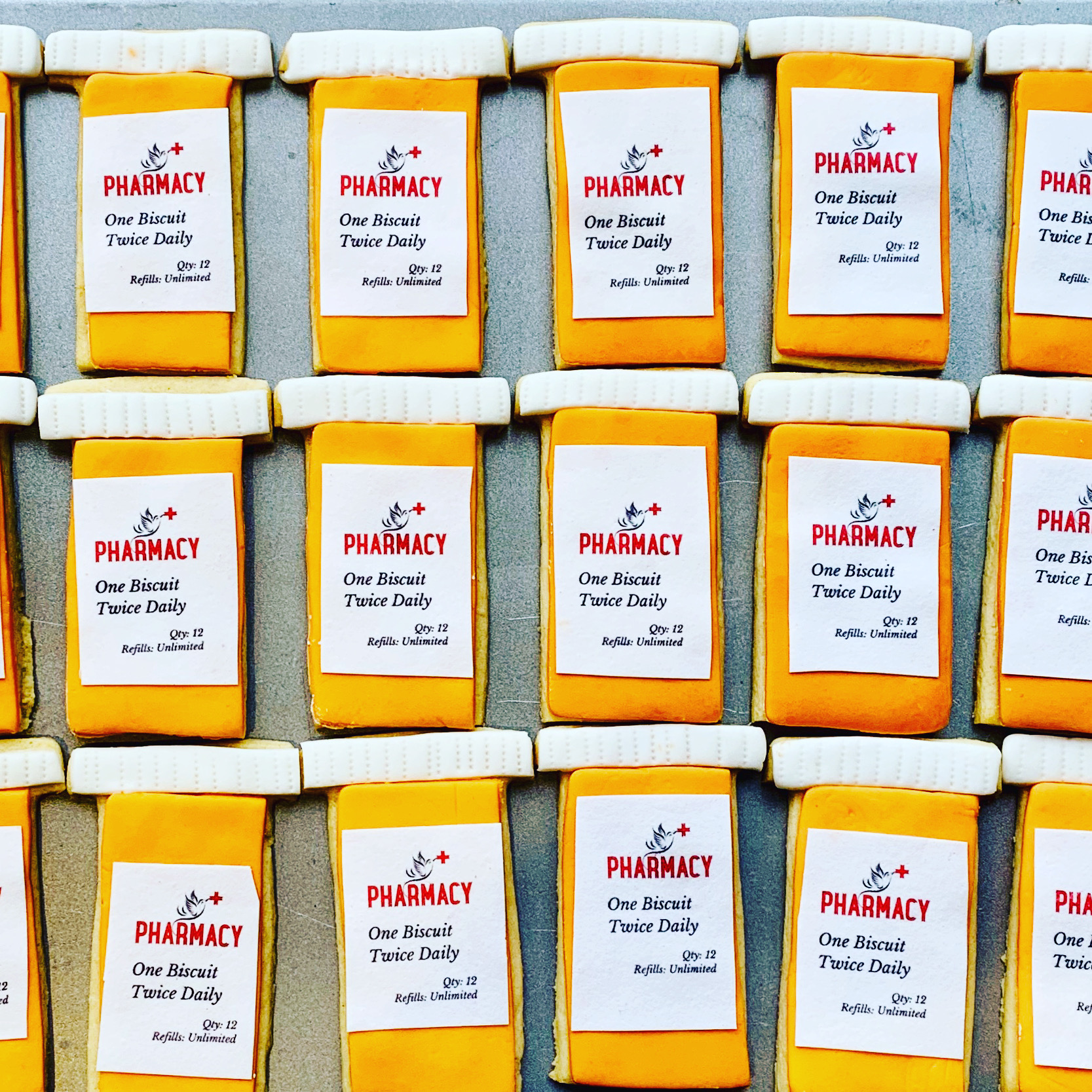 small business pharmacy custom biscuits made by Enchanting Bakes for Holly & Co